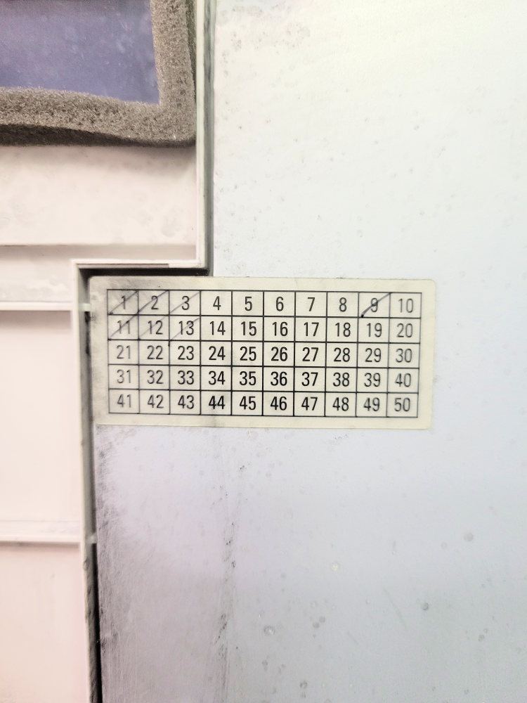 V2100 Tag Matrix sticker inside front door